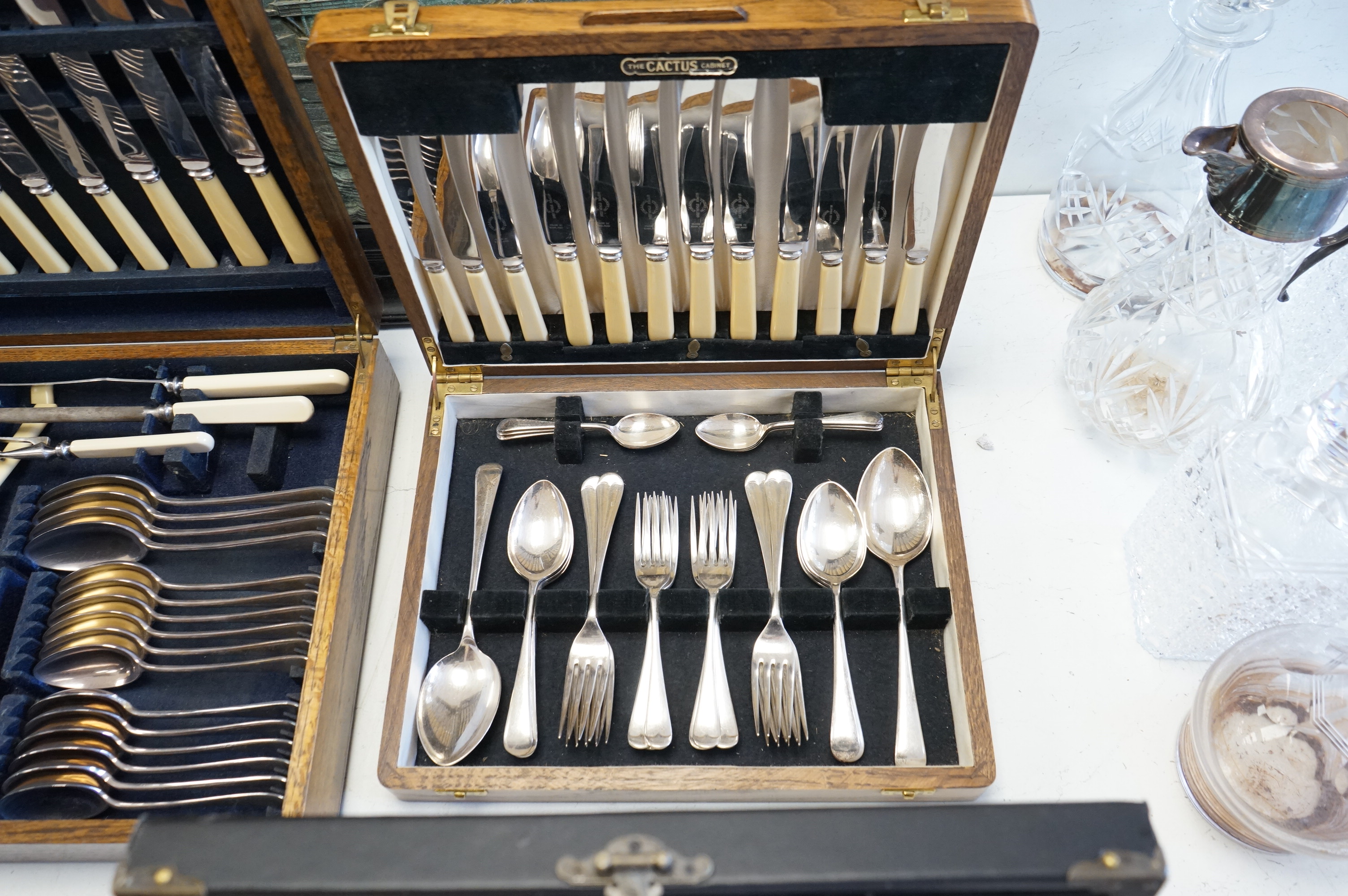 Four cased canteens of silver plated flatware including Kings pattern and Mappin plate